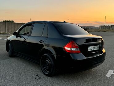 Nissan: Nissan Tiida sedan, qara rəng. - Ban növü: 4 qapılı sedan - Rəng — 1