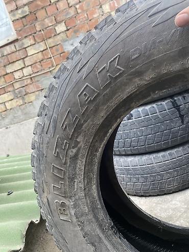 шины зимние 17: Комплект зимних шин Bridgestone Blizzak DM‑V1 - Размер: 265/65 R17 - — 2