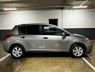 Ferrari: Nissan Versa: 1.8 l | 2008 il Hetçbek