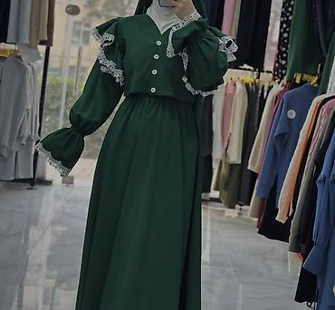 Tünd yaşıl rəngdə uzun xanim paltarı - İki hissəli görünüş: qısa ön lalafo.az -da Tünd yaşıl rəngdə uzun xanim paltarı - İki hissəli görünüş: qısa ön