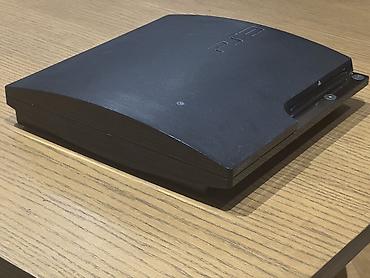 dvd disk: Sony PlayStation 3 Slim oyun konsolu - Model: PS3 Slim (CECH — 3