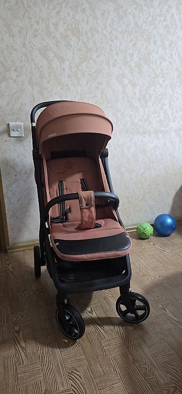 Продаю прогулочную коляску NEWLUX (цвет терракотовый)(б/у в отличном at lalafo.kg Продаю прогулочную коляску NEWLUX (цвет терракотовый)(б/у в отличном