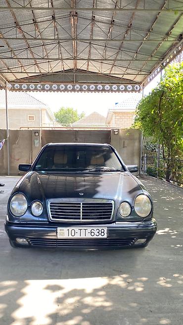 mator 80cc vəlo: Mercedes-Benz E 230: 2.3 l | 1996 il Sedan — 1