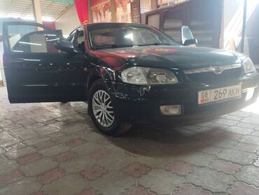 машина продаж спорт: Mazda 323: 1998 г., 1.5 л, Механика, Бензин, Седан