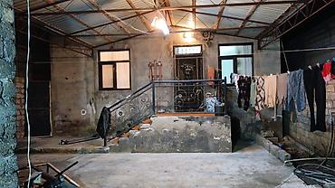 Bağ evlərinin satışı: Binə Savxozda 4 otaqlı ev satılır. - Geniş mətbəx: L formalı mətbəx — 7