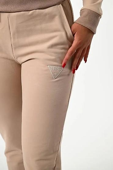 Gornji i donji deo: Ženski komplet trenerke – duks + donji deo - Model: jednobojni — 22