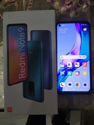 телефон флай 2: Xiaomi Redmi Note 9, 64 ГБ, цвет - Синий, 
 Сенсорный, Отпечаток пальца, Две SIM карты