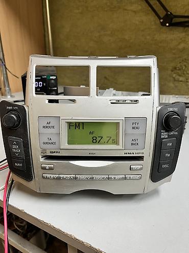 значек тойота: Штатная магнитола для Toyota Yaris (Panasonic Automotive Systems) — — 1