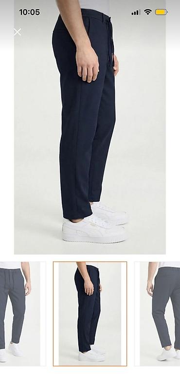 Kişi geyimləri: Məhsul: Kişi şalvarı – tünd göy - Kəsim: Slim-fit, düz paça; gündəlik — 3