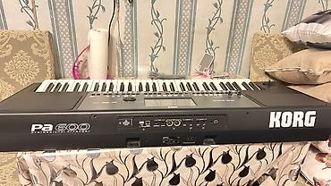 sintezator mp3: Korg pa 600 sadə təzə alətdir üstündə ayaqı karopkası çexolu pedalı — 4