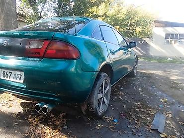 обмен на малолетражку: Mazda 323: 1996 г., 1.8 л, Механика, Бензин, Седан — 4
