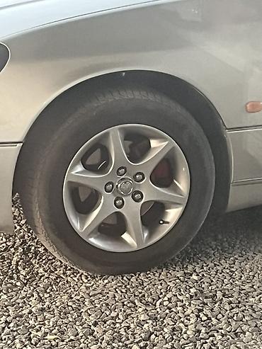 215 60 16: Продаю или меняю на 17 или 18диски Toyota (5‑спицевые), с шинами. - — 2