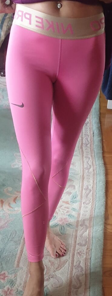 Helanke, biciklistički šortsevi: NIKE pro dri fit original helanke roze boje sa zlatnom debelom gumom — 11