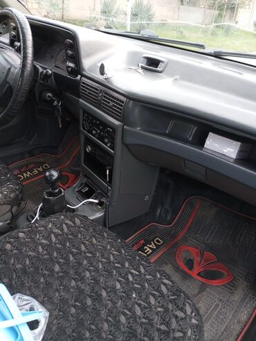 Daewoo: Model: Daewoo Nexia sedan Kuzov: 4 qapılı, gümüşü rəng — 10