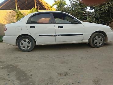 Daewoo Lanos: 1999 г., Кол менен иштөөчү, Бензин, Седан — 3