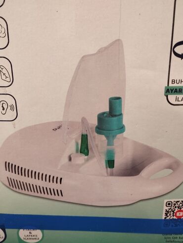 Eşitmə cihazları: Ağ rəngli, yığcam dizaynlı nebulayzer. Nəfəs yollarının müalicəsi üçün