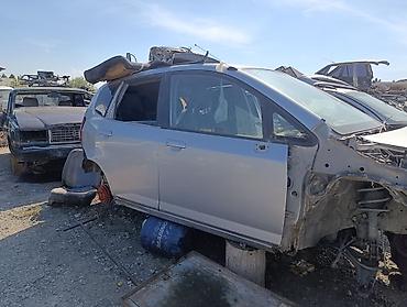 панель фит: Разбор Honda Jazz (Fit Aria/City универсал на фото), правый руль — 4