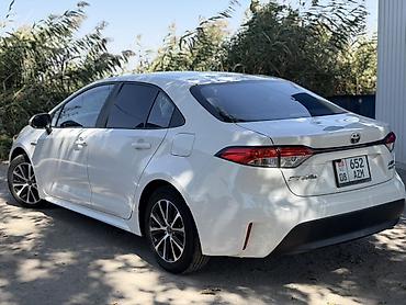 матор хундай саната: Toyota Corolla: 2023 г., Гибрид, Седан — 4