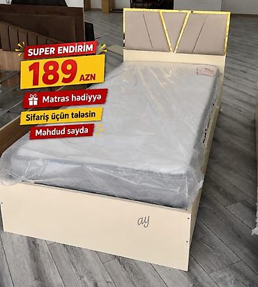 sintifon dosek: Tek nəfərlik müasir dizaynlı çarpayı. - Rəng: açıq krem. - Başlıq — 1