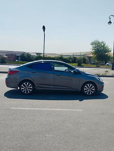 Hyundai: Hyundai Accent sedan - Kuzov: 4 qapılı sedan, boz rəng - Nömrə — 21