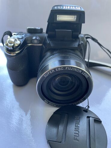 Фотоаппараты: Фотоаппарат fujifilm работает от 4 батареек