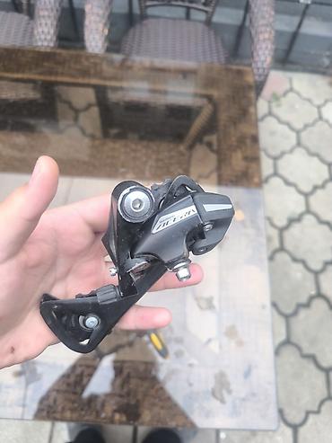Задний переключатель скоростей Shimano Alivio 9 скоростей - Серия