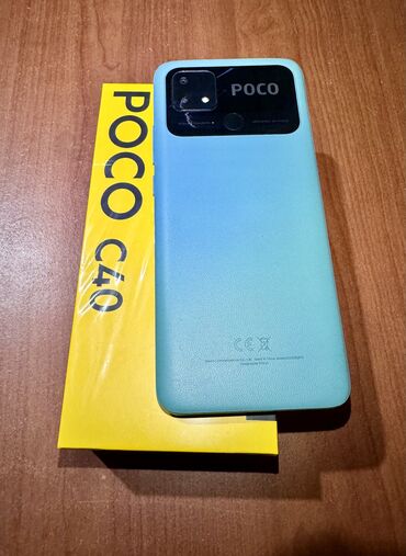 телефон цены: Poco C40, Б/у, 64 ГБ, цвет - Зеленый, 2 SIM