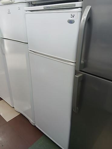 atlant: İşlənmiş 2 qapılı Atlant Soyuducu Satılır, rəng - Ağ, Təkərli — 1