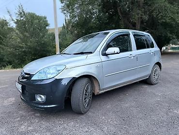 Унаа сатуу: Mazda Demio: 2005 г., 1.4 л, Автомат, Бензин, Хетчбек — 4