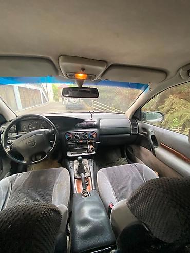opel omega: Opel Omega: 2.5 l | 1994 il Sedan — 7