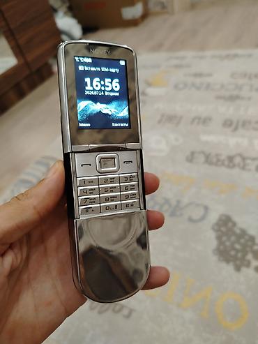 211 nömrə: Novey sürgülü mobil telefon. 2 nomredi.qeydiyyat lazımdı. adapter var — 1