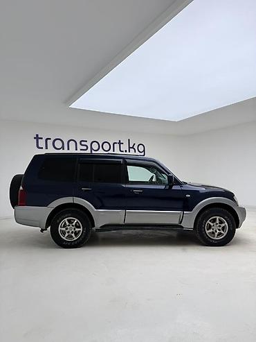 боковой: Mitsubishi Pajero: 2003 г., 3.2 л, Автомат, Дизель, Внедорожник — 5