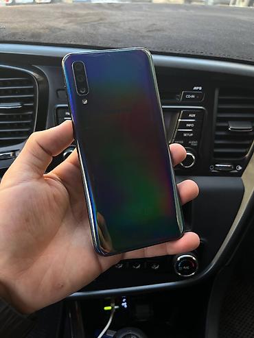 Samsung Galaxy A50, Б/у, 64 ГБ, цвет - Синий, 2 SIM