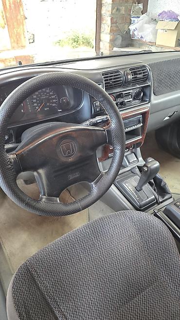 битую машину: Honda Passport: 1999 г., 3.2 л, Автомат, Бензин, Внедорожник — 9