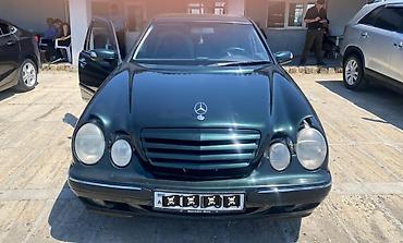 w210 lyuk: Mercedes-Benz E‑Class (W210) sedan - Korpus: qara/yaşıl tünd rəngli — 1