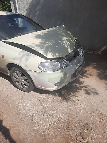 2 5 dizel mator: Nissan Sunny: 1.3 l | 2006 il Sedan — 2