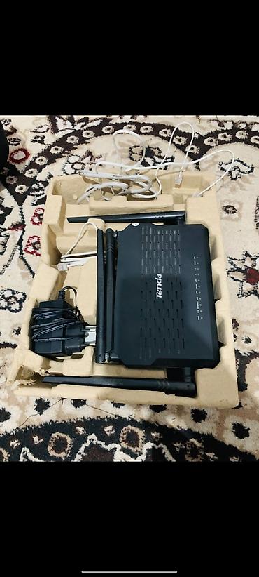 modem router tp link: Wi‑Fi роутер-модем Tenda D305 с поддержкой ADSL2+. Модель оснащена 4 — 1