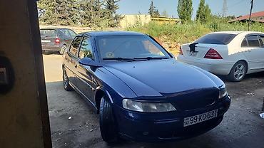 Opel: Opel Vectra B sedan - Kuzov: 4 qapılı sedan, tünd göy rəng - Mühərrik — 1