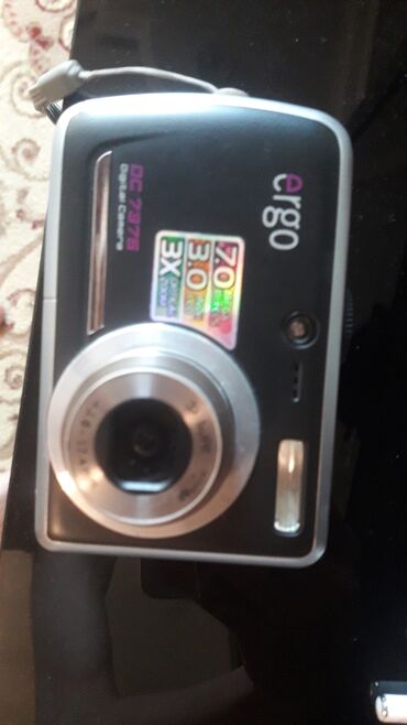 nomrelerin satisi: Ergo 7.0 mega pixels 2014 cu ilin foto aparatidir tecili satilir