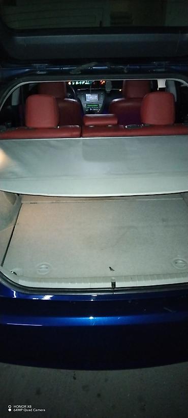 prius salon: Toyota Prius (3-cü nəsil) – mavi rəng, hatchback gövdə. - Hibrid — 9