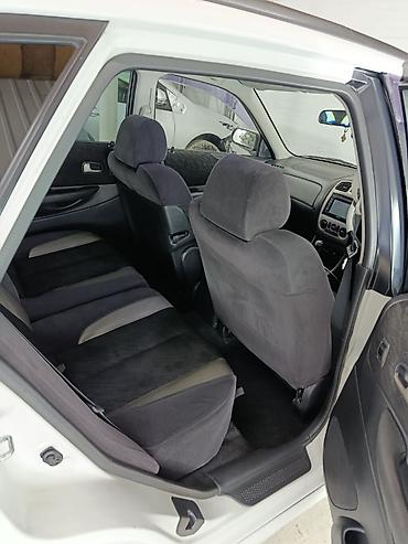 Mazda: Mazda Familia: 2001 г., 2 л, Автомат, Бензин, Универсал — 7