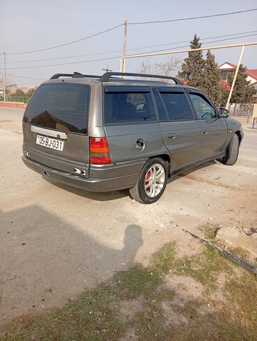 Opel: Opel Astra Caravan (şunur kuzov) Xüsusiyyətlər: - Kuzov — 13