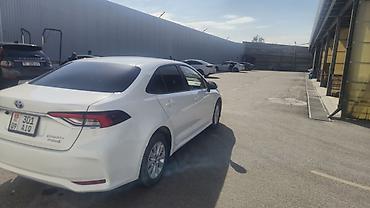 byd e5 2020: Toyota Corolla: 2021 г., 1.8 л, Вариатор, Гибрид, Седан — 6