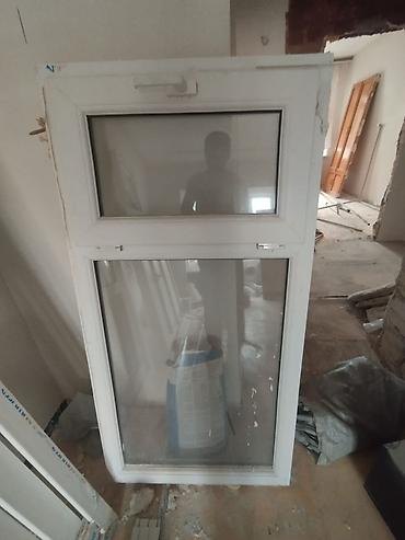 Pəncərələr: PVC pəncərə bloku - Material: ağ rəngli PVC profil - İki bölməli — 1