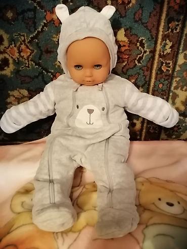 Верхняя одежда: Детские тёплые и на межсезонье комбезы б/у. Состояние хорошее. На — 18