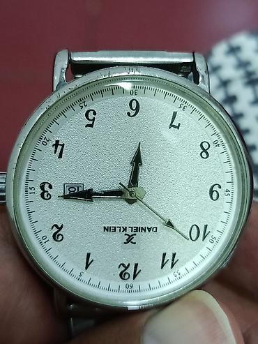 cartier mismar qolbaq: Daniel Klein kişi qol saatı - Korpus və qolbaq: tam metal, gümüşü — 10