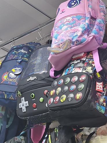 smiggle: Məhsul: Uşaq üçün tematik məktəb çantaları və yemək çantaları (Smiggle — 1