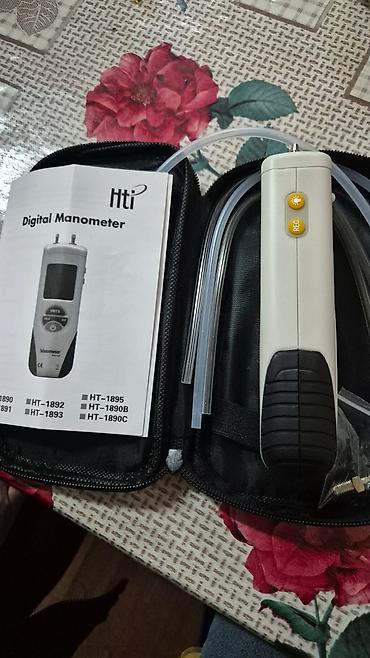manometr: HTI HT-1890 Rəqəmsal Manometr Xüsusiyyətlər: - Model: HTI HT-1890 - — 5