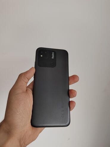 optimal telefon kredit: Xiaomi Redmi 10A, 64 ГБ, цвет - Черный, 
 Кнопочный, Отпечаток пальца