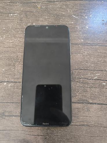radiator islenmis: Xiaomi 32 GB, rəng - Mavi, 
 İki sim kartlı, Barmaq izi — 1